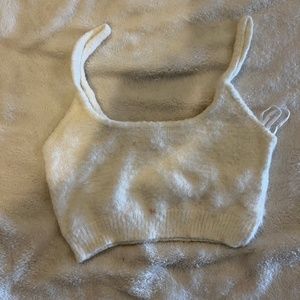 White fuzzy garage tank